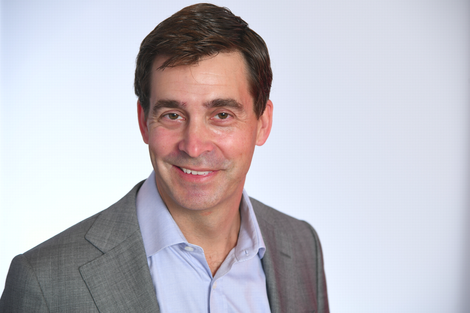 Richard Schlasberg skifter Coca-Cola ud med Danish Crown på sit visitkort.